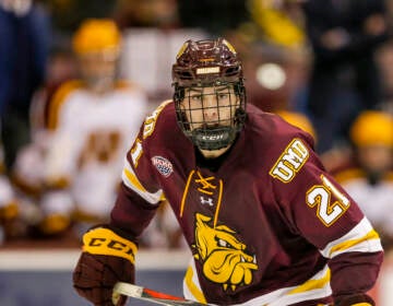 Minnesota Duluth forward Noah Cates skates against Minnesota during an NCAA hockey game on Friday, Oct. 25, 2019 in Minneapolis. (AP Photo/Andy Clayton-King)