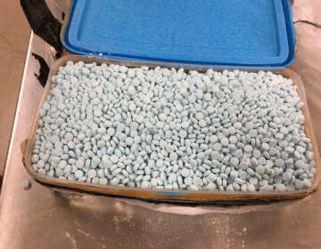 A container of fentanyl pills