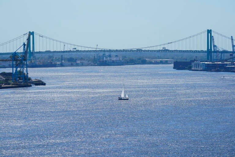 A boat sails on the Delaware River in view of the Walt Whitman Bridge, in Philadelphia, Monday, Sept. 27, 2021