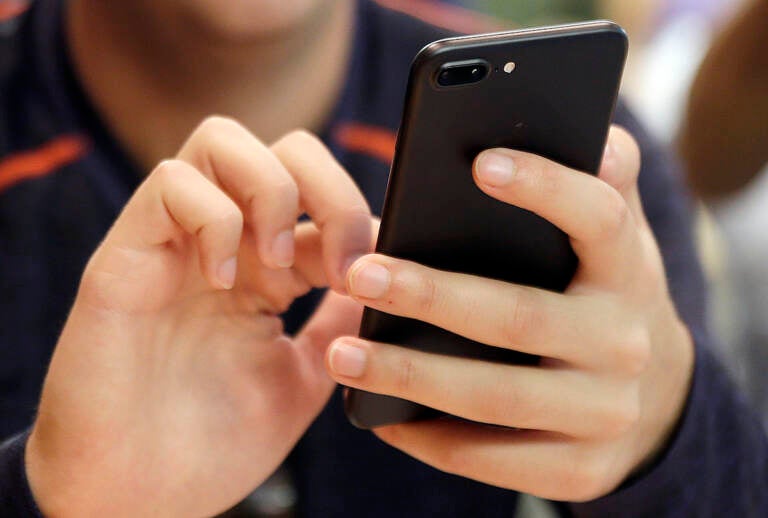  In this Sept. 16, 2017, file photo, a person uses a smart phone in Chicago.  (AP Photo, File)