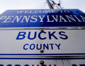 A sign is posted in New Hope, Pa., upon entering Bucks County from New Jersey, Thursday, Nov. 4, 2021. (AP Photo/Matt Rourke)