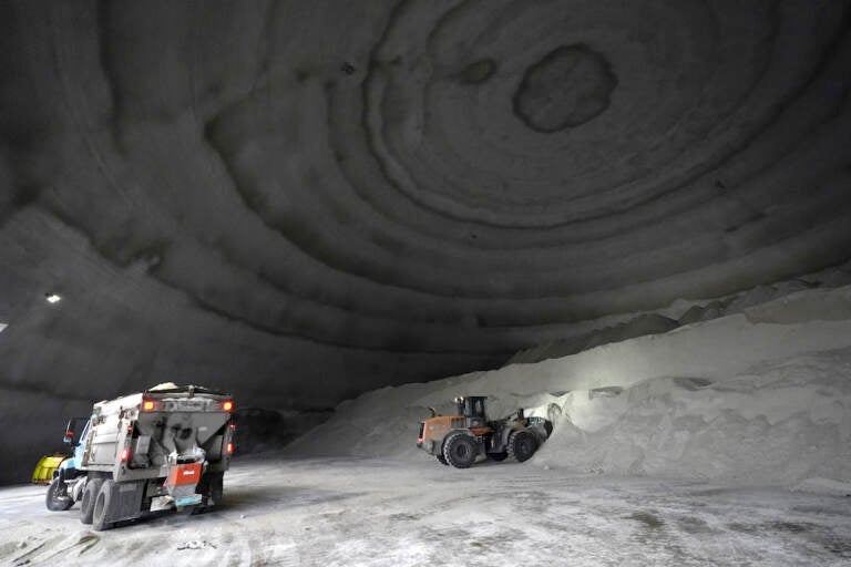 A City of Chicago Department of Streets and Sanitation salt truck waits for a load in a city salt dome in anticipation of a winter storm Tuesday, Feb. 1, 2022, in Chicago. A major winter storm is expected to affect a huge swath of the United States beginning Tuesday, with heavy snow starting in the Rockies and freezing rain as far south as Texas before it drops snow and ice on the Midwest