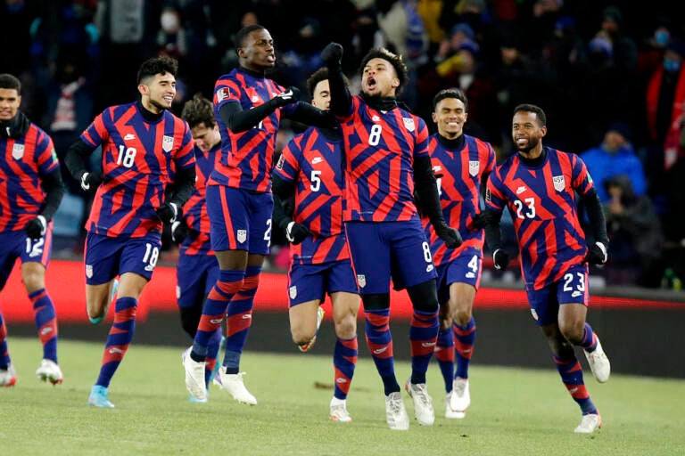 United States' Weston McKennie (8) celebrates a goal with teammates Kellyn Acosta (23), Reggie Cannon (4), Antonee Robinson (5), Tim Weah, (21) and Ricardo Pepi (18) during the first half of the team's FIFA World Cup qualifying soccer match against Honduras, Wednesday, Feb. 2, 2022, in St. Paul, Minn. (AP Photo/Andy Clayton-King)
