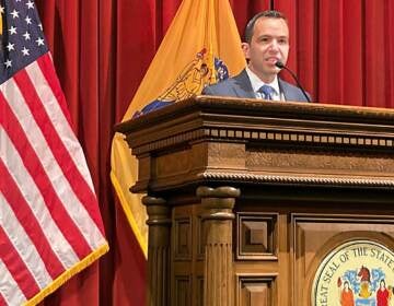 Matt Platkin speaks at a podium