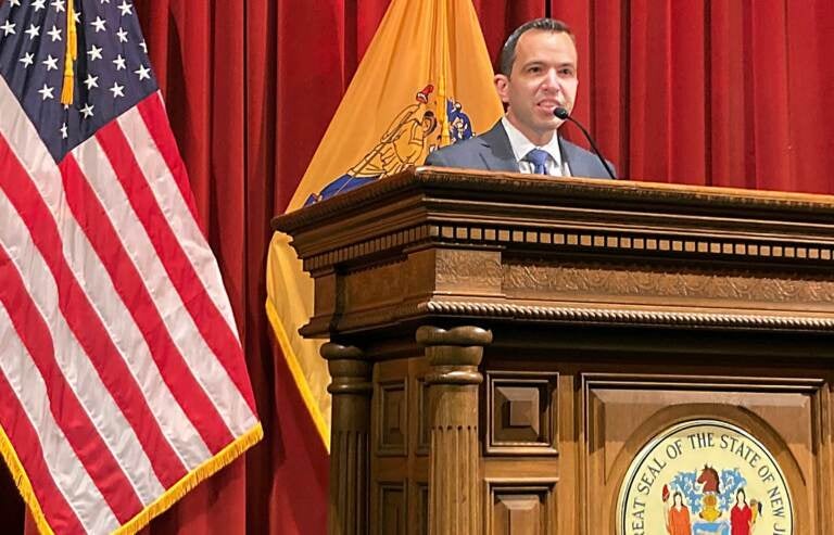 Matt Platkin speaks at a podium