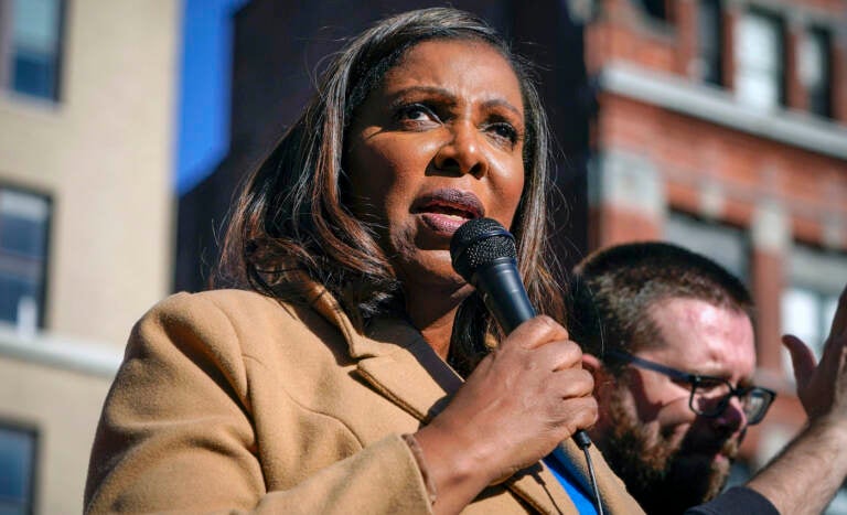 FILE - New York Attorney General Letitia James speaks during a rally in support of home care workers in New York, Tuesday, Dec. 14, 2021. James asked a judge Wednesday to dismiss a lawsuit by former President Donald Trump aimed at halting her yearslong probe into his business practices. (AP Photo/Seth Wenig, File)