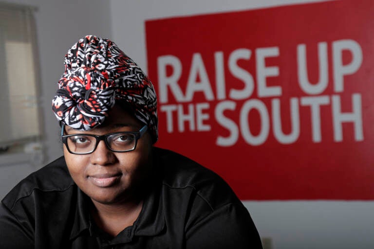 Food service worker Sheree Allen is seen in the Raise Up offices, a branch of the Fight for $15 union, Thursday, Feb. 10, 2022, in Durham, N.C.  (AP Photo/Chris Seward)