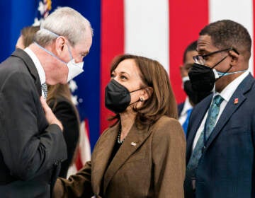 Vice President Kamala Harris speaks to Gov. Phil Murphy after an event highlighting Newark’s efforts to replace lead water pipes, Friday, Feb. 11, 2022 at the Training Recreation Education Center in Newark, N.J. (AP Photo/Stefan Jeremiah)