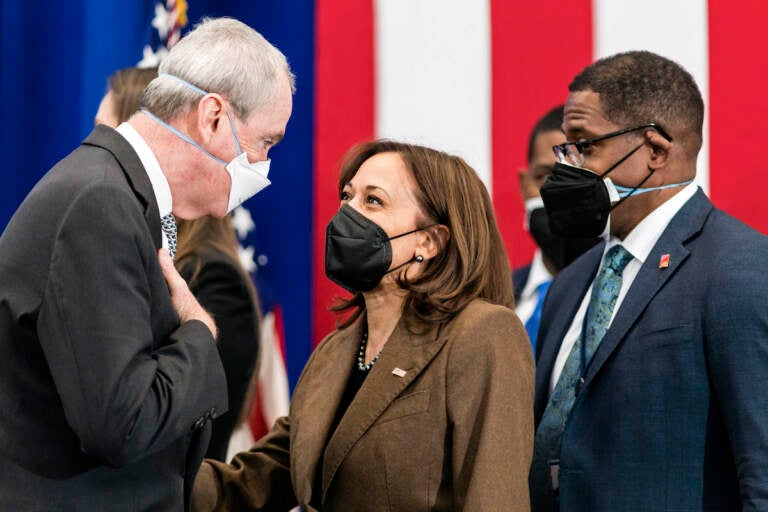 Vice President Kamala Harris speaks to Gov. Phil Murphy after an event highlighting Newark’s efforts to replace lead water pipes, Friday, Feb. 11, 2022 at the Training Recreation Education Center in Newark, N.J. (AP Photo/Stefan Jeremiah)