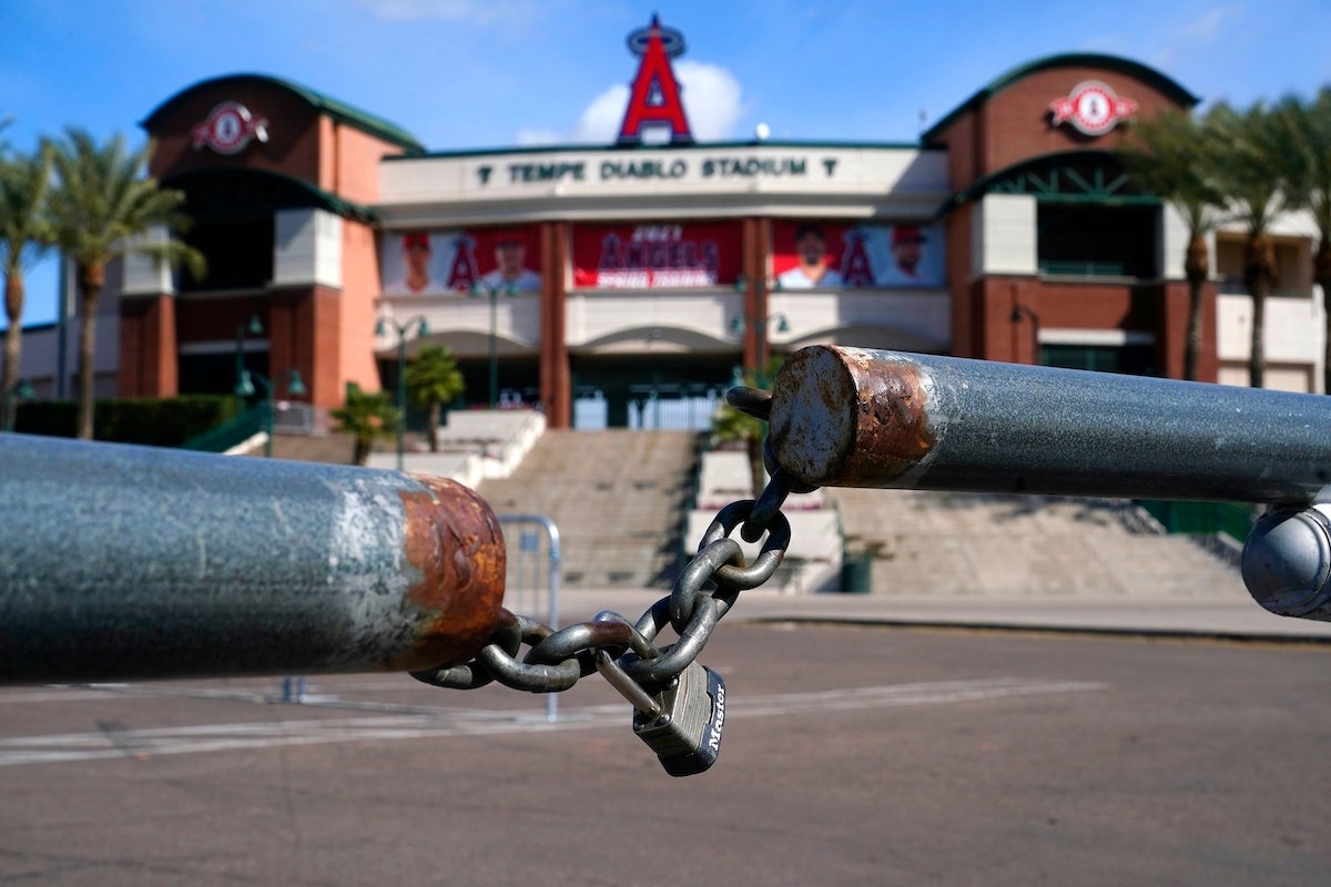 With players locked out, spring training stadiums are empty in Arizona and  Florida