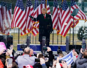 File photo: In this Jan. 6, 2021, photo, President Donald Trump arrives to speak at a rally in Washington. A federal judge on Feb. 18, 2022, rejected efforts by the former president to toss out lawsuits filed by lawmakers and two Capitol police officers, saying in his ruling that the former president's words 