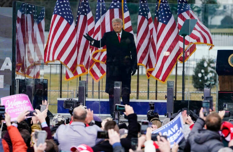 File photo: In this Jan. 6, 2021, photo, President Donald Trump arrives to speak at a rally in Washington. A federal judge on Feb. 18, 2022, rejected efforts by the former president to toss out lawsuits filed by lawmakers and two Capitol police officers, saying in his ruling that the former president's words 