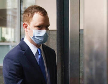 Brandon Bostian, the Amtrak engineer involved in a 2015 derailment in Philadelphia that killed eight people and injured more than 200, arrives at criminal justice center in Philadelphia, Thursday, Feb. 24, 2022. (AP Photo/Matt Rourke)