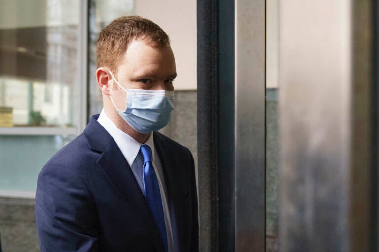 Brandon Bostian, the Amtrak engineer involved in a 2015 derailment in Philadelphia that killed eight people and injured more than 200, arrives at criminal justice center in Philadelphia, Thursday, Feb. 24, 2022. (AP Photo/Matt Rourke)