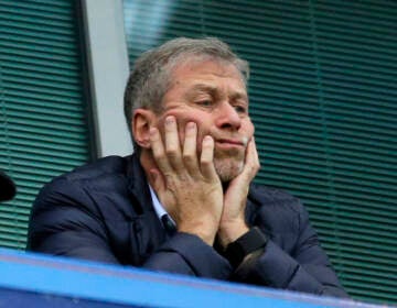 File photo: In this file photo dated Saturday, Dec. 19, 2015, Chelsea soccer club owner Roman Abramovich sits in his box before the English Premier League soccer match between Chelsea and Sunderland at Stamford Bridge stadium in London. (AP Photo/Matt Dunham, File)