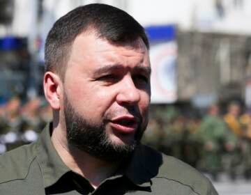 Denis Pushilin, the leader of the Donetsk People's Republic controlled by Russia-backed separatists, speaks to journalists during a rehearsal for the Victory Day military parade in Donetsk, Ukraine, Wednesday, May 5, 2021. (AP Photo/Alexei Alexandrov)