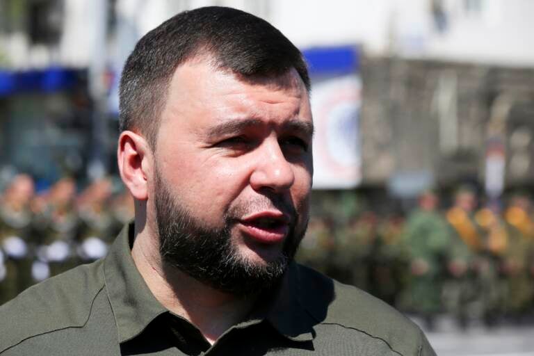 Denis Pushilin, the leader of the Donetsk People's Republic controlled by Russia-backed separatists, speaks to journalists during a rehearsal for the Victory Day military parade in Donetsk, Ukraine, Wednesday, May 5, 2021. (AP Photo/Alexei Alexandrov)