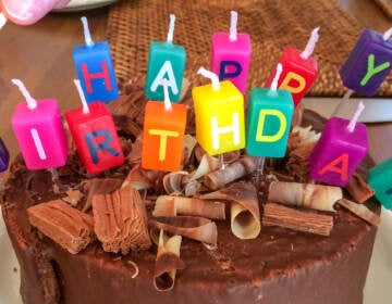 Candles are pictured on a birthday cake