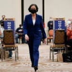 Dr. Val Arkoosh walks to the podium