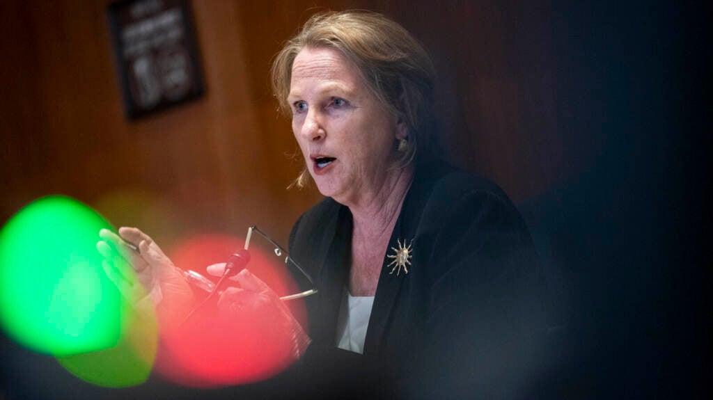 Erin Collins appears at a Capitol Hill hearing