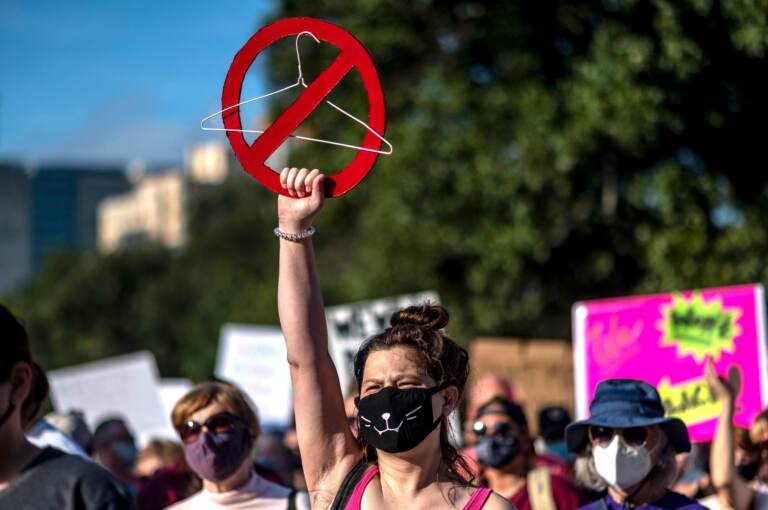 Abortion rights supporters protest in Austin, Texas, in October. Doctors say their worst fears about the Texas abortion law are coming true. (Sergio Flores/AFP via Getty Images)