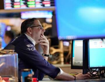 Traders work on the floor of the New York Stock Exchange at the opening bell on Tuesday in New York. Stocks tumbled on Thursday after Russia invaded Ukraine, sending the Nasdaq into what's known as a bear market. (Photo by TIMOTHY A. CLARY / AFP) (Photo by TIMOTHY A. CLARY/AFP via Getty Images)