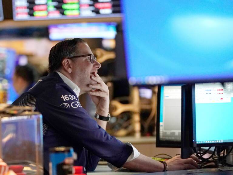 Traders work on the floor of the New York Stock Exchange at the opening bell on Tuesday in New York. Stocks tumbled on Thursday after Russia invaded Ukraine, sending the Nasdaq into what's known as a bear market. (Photo by TIMOTHY A. CLARY / AFP) (Photo by TIMOTHY A. CLARY/AFP via Getty Images)