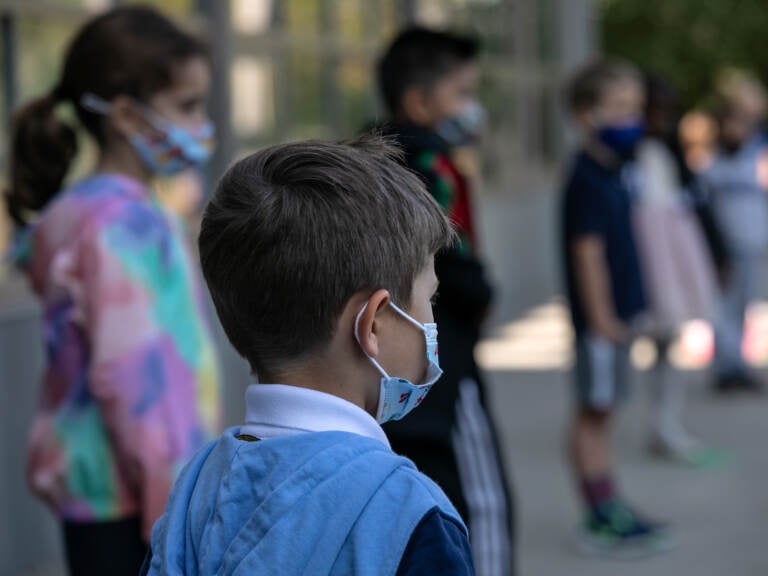 The White House says it is planning to distribute masks for children. The announcement comes as many states have been dropping mask requirements for schoolchildren. (John Moore/Getty Images)