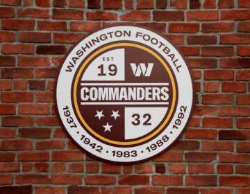 A detailed view of a Washington Commanders logo during the announcement of the Washington Football Team's name change — an announcement welcomed by Native American activists who felt the team's former 