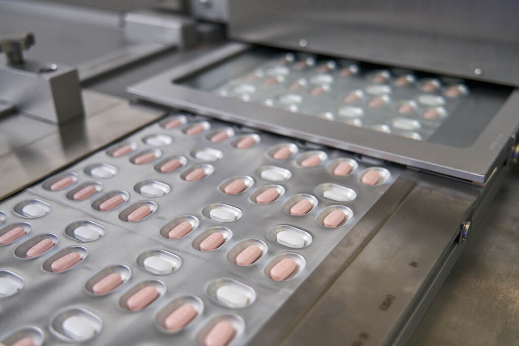 Paxlovid tablets are packaged at a Pfizer factory.