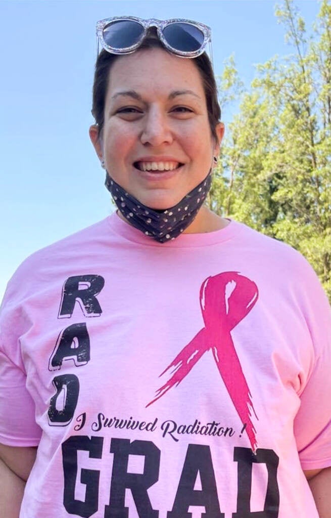 Katie Ripley wears a pink breast cancer t-shirt