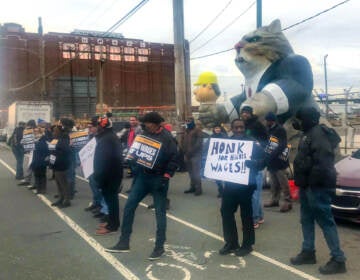 Protesters rally outside UPS on Oregan Avenue