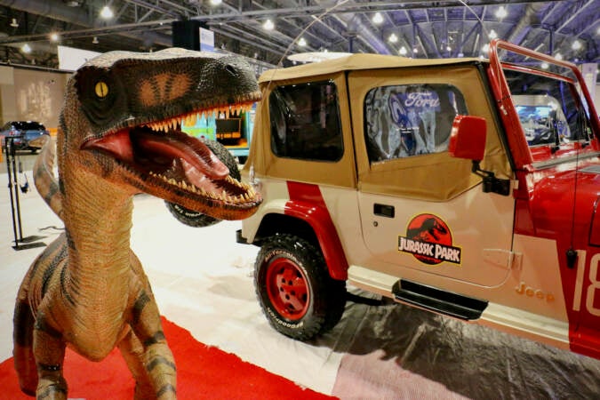 The 1993 Jeep Wrangler that appeared in ''Jurassic Park'' is displayed at the Philadelphia Auto Show. (Emma Lee/WHYY)