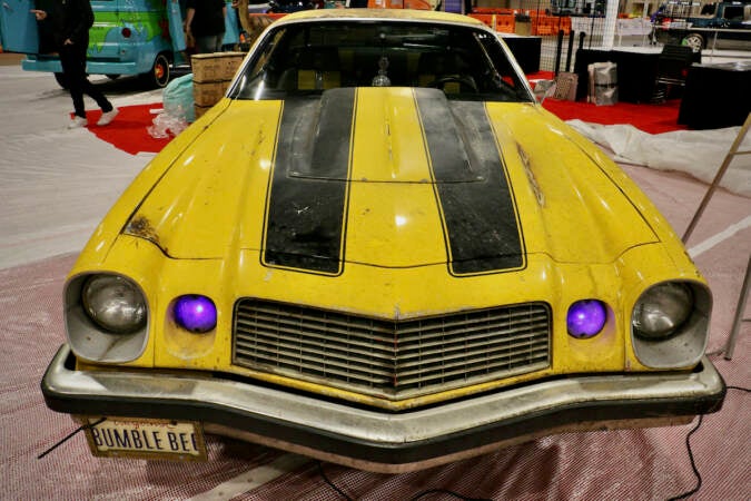 The 1977 Chevrolet Camaro used in the movie ''Transformers'' is on display in the Hollywood section of the Philadelphia Auto Show. (Emma Lee/WHYY)