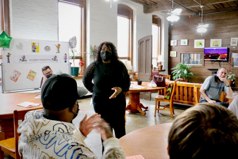 Former Philadelphia Poet Laureate Trapeta Mayson leads a poetry workshop at the Open Door Clubhouse in Kensington