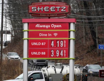 Gas prices are shown on a Sheetz billboard, with prices listed as $4.19 a gallon.