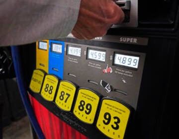 Up-close view of a gas pump and prices.