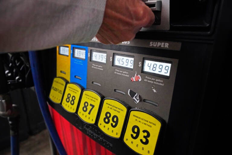 Up-close view of a gas pump and prices.