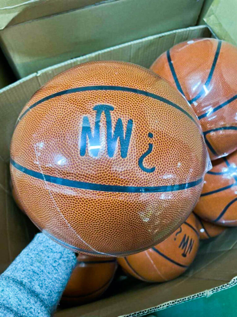 Basketball branded with Not Wright LLC logo