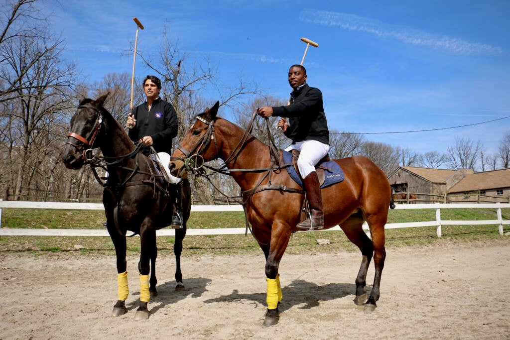 Kareem Rosser and Nacho Figueras on their ponies