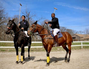 Kareem Rosser and Nacho Figueras on their ponies