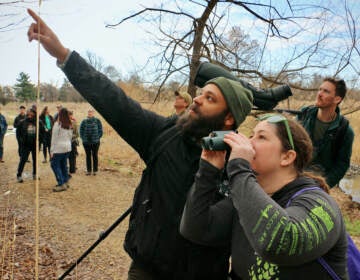 Jason Hall leads a bird walk