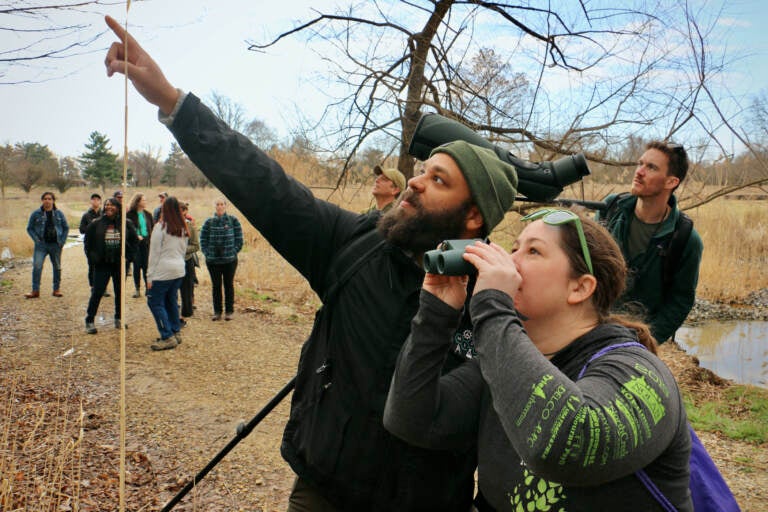 Jason Hall leads a bird walk