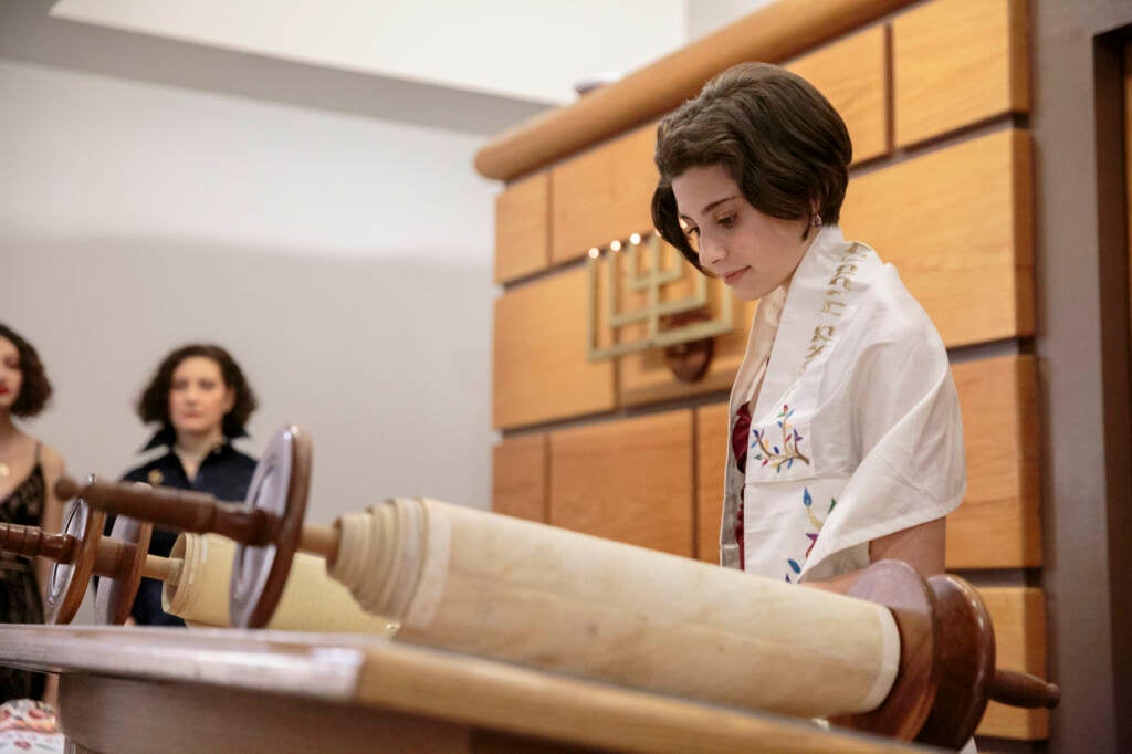 A young woman prepares to celebrate her bat mitzvah at The Village Temple in Manhattan on a recent Saturday morning. (Sarah Blesener/NPR)