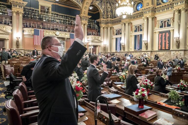 First term legislators of the Pennsylvania House of Representatives are sworn-in, Tuesday, Jan. 5, 2021, at the state Capitol in Harrisburg, Pa. The ceremony marks the convening of the 2021-2022 legislative session of the General Assembly of Pennsylvania. (Laurence Kesterson/AP Photo)