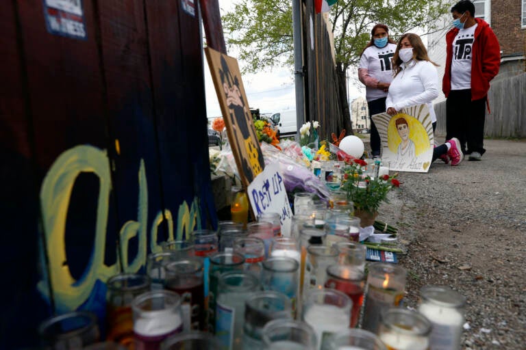 File photo: People pay tribute as they attend a peace walk honoring the life of police shooting victim 13-year-old Adam Toledo, Sunday, April 18, 2021, in Chicago's Little Village neighborhood. (AP Photo/Shafkat Anowar)