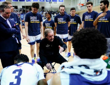 Jefferson coach Herb Magee speaks with his team during an NCAA college basketball game against USciences, Wednesday, Feb. 23, 2022, in Philadelphia. Thomas Jefferson University coach Herb Magee has retired after a Hall of Fame career. Magee went 1,144-450 in 54 seasons at Thomas Jefferson University.