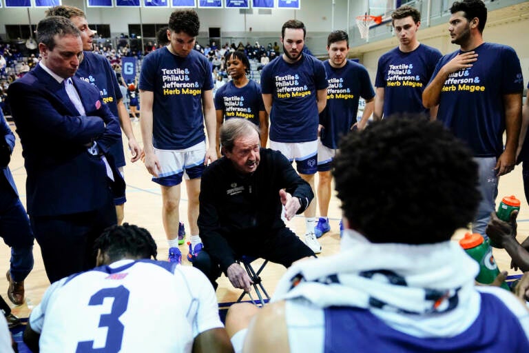 Jefferson coach Herb Magee speaks with his team during an NCAA college basketball game against USciences, Wednesday, Feb. 23, 2022, in Philadelphia. Thomas Jefferson University coach Herb Magee has retired after a Hall of Fame career. Magee went 1,144-450 in 54 seasons at Thomas Jefferson University.