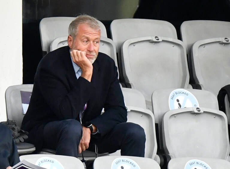 Chelsea soccer club owner Roman Abramovich, right, attends the UEFA Women's Champions League final soccer match between Chelsea FC and FC Barcelona in Gothenburg, Sweden, Sunday, May 16, 2021