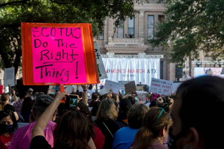 File photo: People attend the Women's March ATX rally, Oct., 2, 2021, at the Texas State Capitol in Austin, Texas. (AP Photo/Stephen Spillman, File)